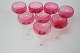 Glas med rosa kumme